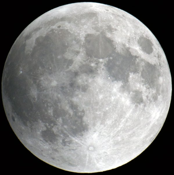 Lunar eclipse. Penumbral phase (note slight darkening of western limb at left.